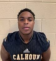 Package deal: Calhoun's Lewis twins are a force on, off field