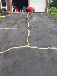 How to repair and seal an asphalt driveway (video). How To Fill Driveway Cracks The Diy Doghouse