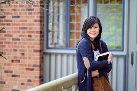 Photo by prathan chorruangsak on mostphotos. Asian College Student Carrying A Book On Campus By Take A Pix Media College Student Stocksy United