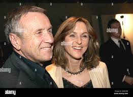 French actor Yves Renier, his wife Karin and their sons Jules and Oscar  attend the match between France's Richard Gasquet and Peter Wessels from  the Netherlands in the French Open at the