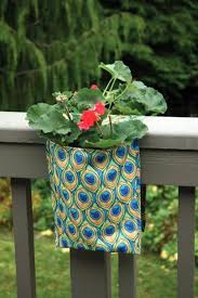 Scatter seasonal blooms around your outdoor sofa or bistro table. 25 Space Saving Ideas Creating Beautiful Balcony Designs Porch Decorating With Modern Hanging Planters