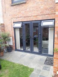 Maybe you would like to learn more about one of these? Anthracite Grey Kommerling Uk Upvc French Doors And Side Panels Installed In Newark Nottingham F Upvc French Doors Garage Door Design Aluminium French Doors