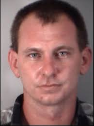 Father charged with manslaughter after son's shooting death