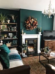 And then the dark wood blends in beautifully. How To Use Dark Green In Your Living Room Melanie Jade Design