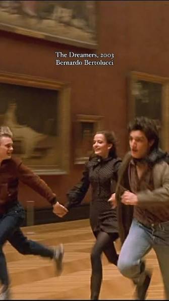 In The Dreamers (2003 Bernardo Bertolucci) Matthew, Isabelle, and Theo  burst into a full sprint through the Louvre, their laughter echoing through  the vast, hushed halls. They weave between astonished ...
