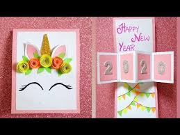 Decorate the front of the card with a drawing, words cut out of colorful paper, decorations made from pipe cleaners, or anything else you can think of. Diy Unicorn Twist Pop Up New Year Greeting Card How To Make New Year Greeting Card Youtube Cards Handmade Unicorn Card New Year Greeting Cards