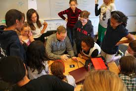 A Guest Speaker In The Middle School Teaches Students A Card Trick He Learned In Africa After Sharing His Experien Teaching Middle School School Private School