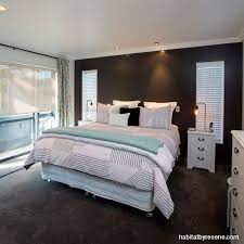 This Master Bedroom Has A Feature Wall In Resene Bokara Grey Which Ties In With The Carpet Colour The Bed Is Dressed I Grey Carpet Buying Carpet Main Bedroom