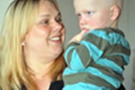 Brave youngster back home after trip to USA for treatment