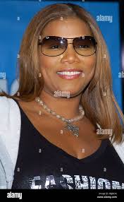 Queen Latifah arriving at The Ice Age: The Meltdown" World Premiereat the  Grauman's Chinese Theatre in Los Angeles. March 19, 2006.QueenLatifah078  Red Carpet Event, Vertical, USA, Film Industry, Celebrities, Photography,  Bestof, Arts