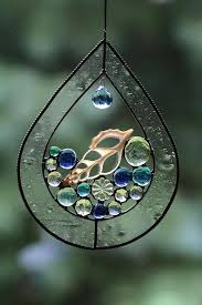 This Stained Glass Hanger Is The Coolest Thing I Ve Ever Seen Stainedglasskitchen Stained Glass Ornaments Stained Glass Diy Stained Glass Art
