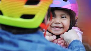 Photos: Falls Area Bicyclists donate helmets to St. Francis House