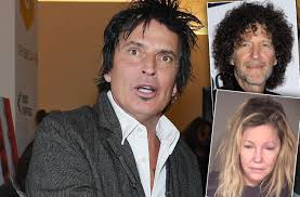 Tommy wore a white leather tuxedo, while heather donned a fishtail gown. Tommy Lee Slams Howard Stern Over Heather Locklear Breakdown