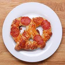 Cheese Stuffed Pizza Pretzels Recipe By Tasty Recipe Recipes Appetizer Recipes Homemade Pretzels