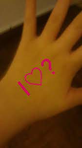 Red apple and the heart which is cut out from apple. I Ve Got An I Heart Question Mark Written On The Back Of My Hand Back Of My Hand Taylor Alison Swift Taylor Swift