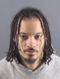 A Central Peoria man, facing murder and RICO allegations, was ordered held  pending the outcome of his trial when he appeared in court