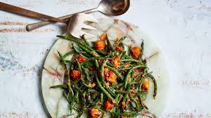 Blistered Green Beans With Tomato Almond Pesto Recipe Recipe Green Bean Recipes Healthy Holiday Recipes Thanksgiving Vegetables Recipes