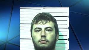 Iowa man charged with fatally shooting his parents