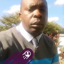 Steve Crossman is just leaving the office bound for Equatorial Guinea. He  is proudly showing off his black folder full of fascinating facts about  AFCON. He let us have a liitle peak