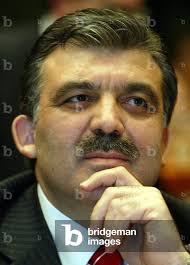 Image of Turkish Prime Minister Abdullah Gul listens to questions of members