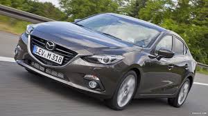 The titanium flash has the copper brown and dark grey car color combination. 2014 Mazda3 Sedan Caricos