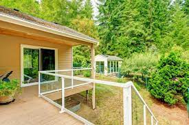 A beautiful exterior railing adds distinction and style to homes and outdoor living spaces. Glass Railing Systems Panorama Railings Blog
