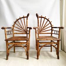 A Striking Pair Of Bamboo Chairs Produced Circa 1900 Highly Decorative With Carved Detailing To The Handles Bamboo Chair Antique Bamboo Bamboo Furniture