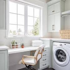 Check out the top five trends in the furniture and decor industry to help you create the laundry room you've dreamed of. Built In Laundry Room Desk Design Ideas
