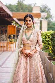 An Elegant Fun Delhi Wedding With A Bride In Stunning Pastels Wedmegood Backless Wedding Dress Bridal Outfits Indian Bridal Outfits