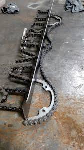 Using Old Sprockets And Chain From A Atv Or Dirt Bike To Make Name Shelf Dirt Bike Room Bike Room Dirt Bike Bedroom