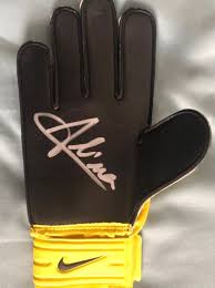 Alisson to wear commemorative ray clemence kit. Alisson Becker Hand Signed Nike Goalkeeper Glove Exact Catawiki