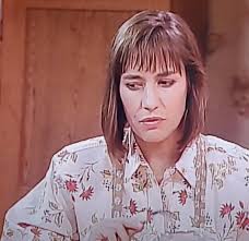 Jackie's eye makeup. This scene had me doing a double take