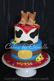 Adorable western decor details include cowboy boots, a sweet baby shower quote in a rustic frame. 16 Ideas Baby Shower Boy Cake Country Cowboy Theme