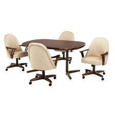 Chromcraft caster chairs are one of the most well known brands we carry and come in your choice of numerous fabrics and vinyls. Dining Chairs With Casters You Ll Love In 2021 Visualhunt