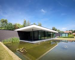 House Faes Hvh Architecten Archdaily Open floor plans are a signature characteristic of this style.