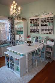 Pick out a favorite color for the pegboard or the back of a shelf to define and beautify the craft room storage space. 10 Creative Craft Rooms With Style Craft Room Office Dream Craft Room Diy Craft Room