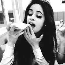 Camila eating pizza, lol :)