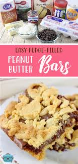 Fudge Filled Peanut Butter Bars Recipe Peanut Butter Dessert Recipes Dessert Recipes Easy Cookies Recipes Christmas