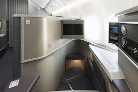 First class, business class and economy class. American Airlines Boeing 777 200ers Will Lose First Class Section Gain 13 Seats