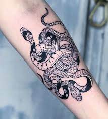 Best Snake Tattoos Tattoo Insider Snake Tattoo Design Tattoos Body Art Tattoos