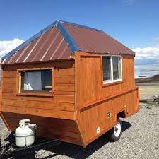 Man Converts Pop Up Trailer Into Micro Cabin On Wheels Diy Camper Trailer Homemade Camper Pop Up Trailer