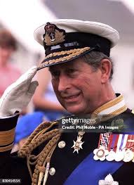 The Prince of Wales takes the salute wearing a spring of Bollan Bane,...  News Photo