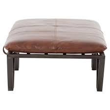 Coffee table ottoman features four reversible cushion tops for a combined table surface or individual lap trays, concealing interior storage, from homelegance. Friedrich Industrial Loft Tan Metal Coffee Table Ottoman Kathy Kuo Home