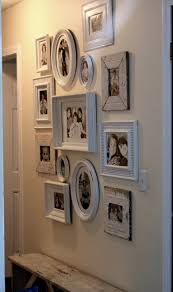 The frame i dug out of the closet was dark chocolate brown ~ not exactly the look i was going for! White Frames Its For The Home Photo Wall Gallery Rustic Wall Art Frames On Wall