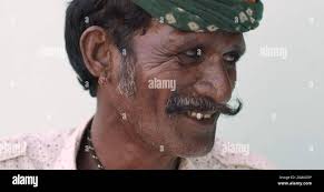 Indian male native costume turban hi-res stock photography and images