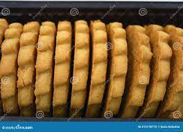 Delicious Sandy Sweet Cookies with Sharp Edges and Chocolate and White  Filler Invested in Brown Brown Packaging. Stock Photo - Image of cookie,  bake: 212178770