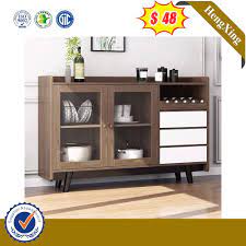 This fashionable accent piece pulls double duty, providing a distinctly urban look to your bedroom or entryway as well as a convenient spot to stow an array of belongings like shoes, linens, pillows and more. China High Quality Wooden Dining Room Storage Cabinet Ul Ca085 China Chest Drawer Dining Cabinet