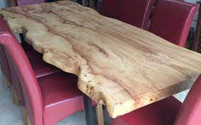 We can make these solid oak slab table tops to the size and specification that you desire. Waney Edge Dining Tables Unique Wild Wood Furniture