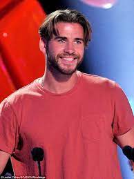 Liam Hemsworth Debuts Cringe Inducing Middle Part Mushroom Haircut Long Hair Styles Men Middle Part Hairstyles Cool Hairstyles For Men