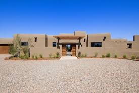Contemporary or modern house plans are becoming increasingly popular and even a welcome change in home design. Contemporary Santa Fe Style Custom Home Builders Construction Tierra Concepts Adobe House Santa Fe Style Homes Santa Fe Home